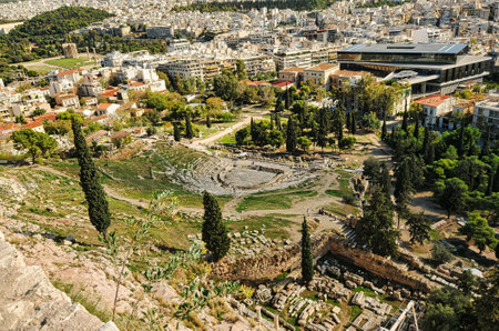 Picturesque view of Greek ruins of Theatre of Dionysos Eleuthereus - stone Roman Theater at the Acropolis hill. Theater dedicated to Dionysus, the god of plays and wine. Athens, Greece.の写真素材