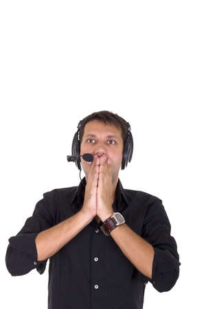 man in studio with headphones and microphone completely surprisedの写真素材