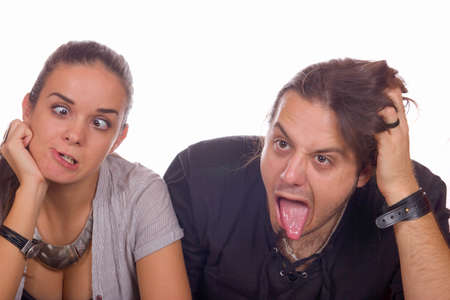 cute couple fooling around with an expressionの写真素材