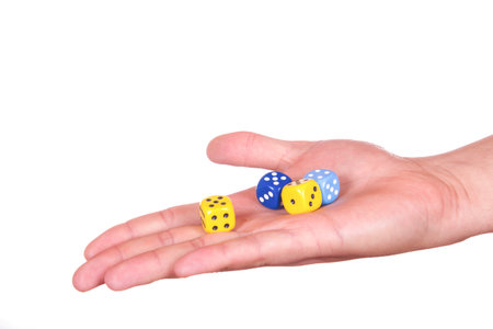 Hand holding yumb cubes isolated on white background