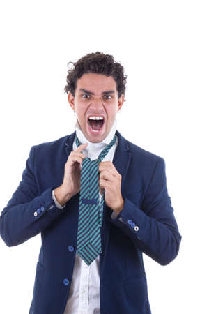 angry adult man in suit with expression tied tieの写真素材
