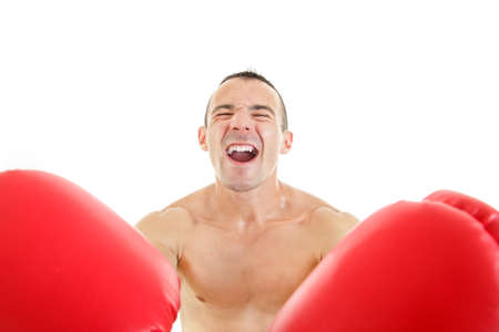 funny portrait of a happy man with red boxing gloves in front of the camera, a victory over an opponent in the ringの写真素材