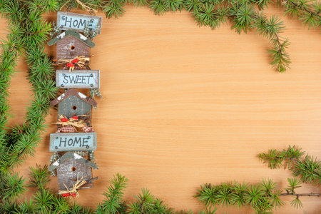 Wonderful Christmas decoration with fir tree and gift with a motif or motive home sweet home in...