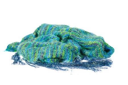 Colourful handmade blue neckwear or scarf of woolen knitted fabric texture isolated on white background. Clean studio shoot of female or woman clothing object. Fashion material photoの写真素材