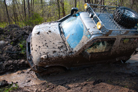 4x4 SUV during the autumn expedition in difficult conditions.