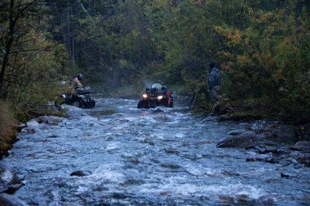 ATV in the expedition overcomes the water barrier