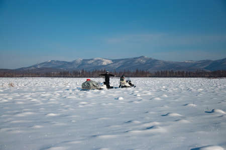 Traveling and outdoor activities in winter on snowmobiles.の写真素材