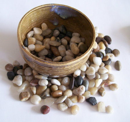 Pebbles in a bowlの写真素材