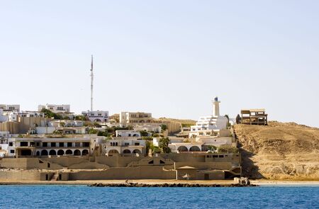 The expanding part of Sekalla in Hurghada Egypt. Hotel compex under construction in the background right next to the desertの写真素材