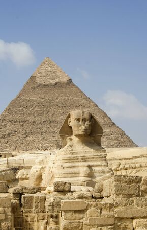 The Sphinx guarding the pyramid of its master - pharaoh Chephren (Khafre)の写真素材