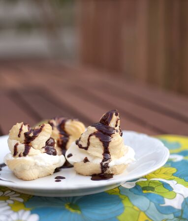 Flyffy creamfilled french petit choux pastries.の写真素材
