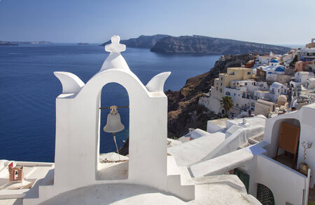 Image of the view over the caldera and traditional rock houses  Santorini, Greece  の写真素材