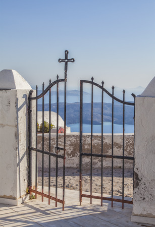 Metal gate in a village of Santorini, Greece.の写真素材