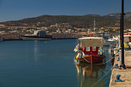 Image of small boat harbour in Agios Nikolaos, Crete.の写真素材
