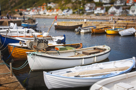 Image of small fishing and rowing boats. Molle harbour, Sweden.の写真素材