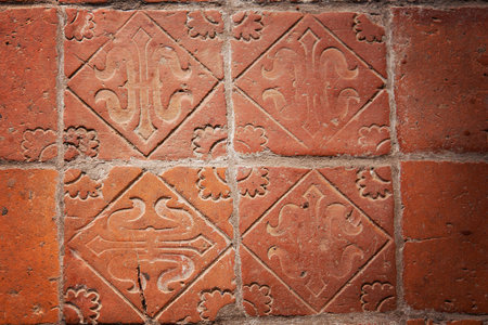 Image of medieval hand-made teracotta floor tiles.