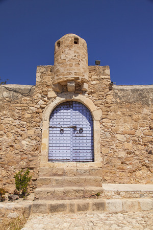 Image of the blue entrance door to the venetian castle in Sitia, Crete.のeditorial素材