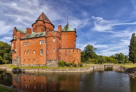 Image of Hjularod red brick castle in Sweden, built in a french medieval romantic style.の写真素材