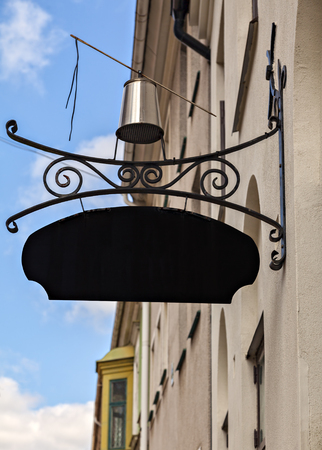Image of vintage black metal hanging sign.の写真素材