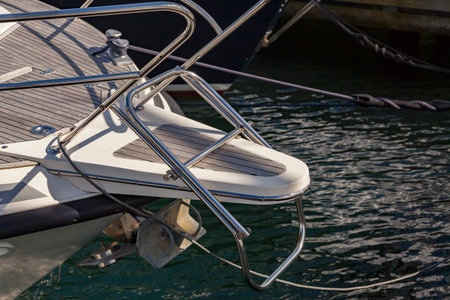 Detail of a diving or swiming platform on a luxury yacht.