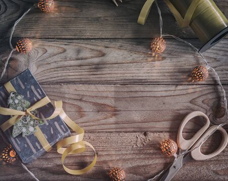 Image of gift wrapping mockup scene with string bauble lightsの写真素材
