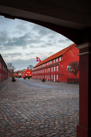 COPENHAGEN, DENMARK - DECEMBER 24, 2016. The red architecture and cobbled streets of the citadel.