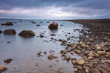 Moody weather on rocky shore. Hittarp, Sweden. の写真素材