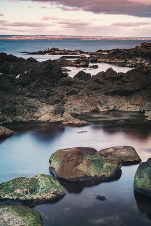 Rocky beach landscape in Arild, south Sweden. の写真素材