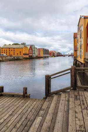 Colourful buildings along the river nidelva, in Trondheim, Norway.の写真素材