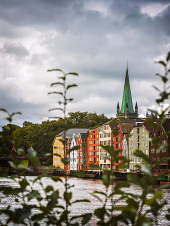 Colourful buildings along the river nidelva, in Trondheim, Norway.