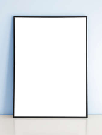 Thin black mock up frame on table with blue wall.の写真素材