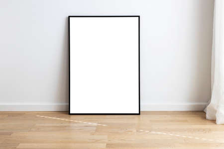 Rectangular mock up standing in a room with wooden flooring.の写真素材
