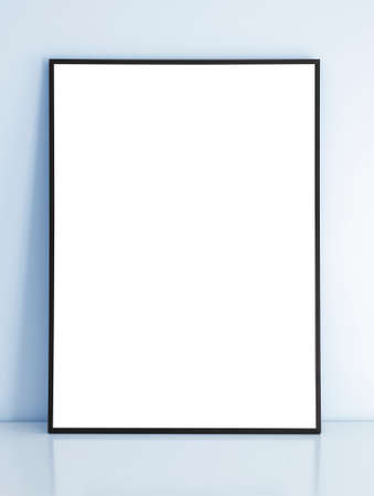 Thin black mock up frame on table with blue wall.の写真素材
