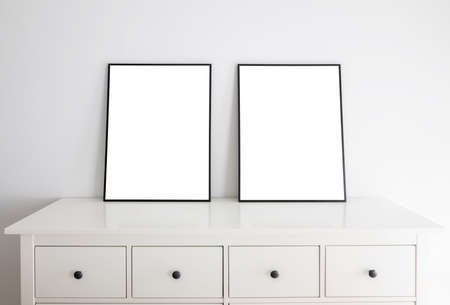 Empty frames for mock up in standing portait mode.の写真素材