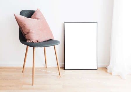 Modern interior with mockup frame and chair.の写真素材
