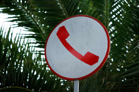 Antique phone sign in italy の写真素材