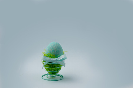 Easter decoration, one turquoise eggの写真素材