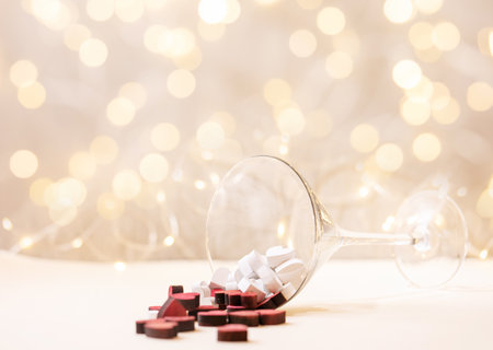 Valentines day background with small red and white wooden hearts over white background. Copy spaceの写真素材