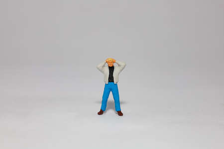 Miniature suspects of criminal , isolated on white backgroundの写真素材