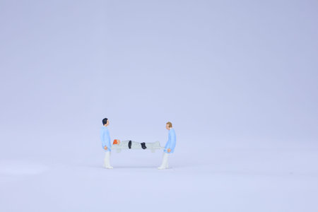 Miniature paramedics who take patients to the emergency roomの写真素材