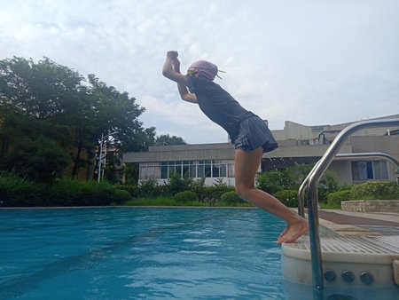 Swimming and gear in the pool in summer