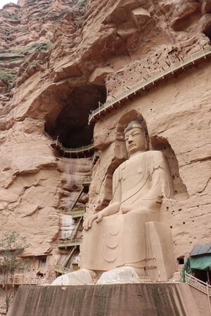Buddha statue at Bingling Cave Temple in Yongjing, Gansu Province, China.の写真素材