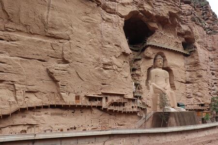 Buddha statue at Bingling Cave Temple in Yongjing, Gansu Province, China.の写真素材