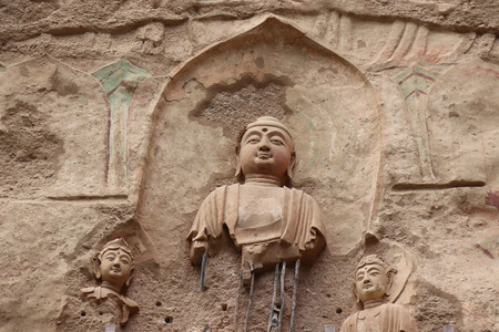 La Shao temple with giant 30-meter Buddha carved into rock at water Curtain Caves in Wushan, Gansu province, China.のeditorial素材