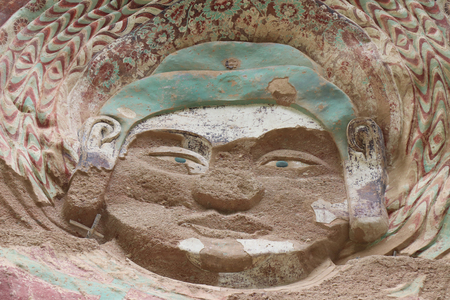 La Shao temple with giant 30-meter Buddha carved into rock at water Curtain Caves in Wushan, Gansu province, China.のeditorial素材