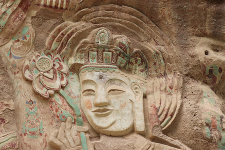 La Shao temple with giant 30-meter Buddha carved into rock at water Curtain Caves in Wushan, Gansu province, China.のeditorial素材