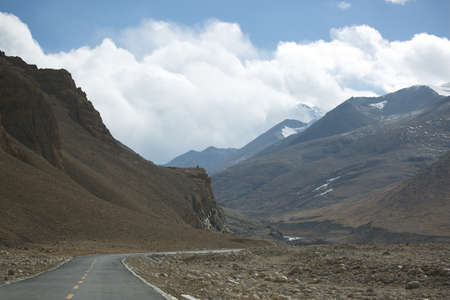 snow mountain and highway roadの写真素材