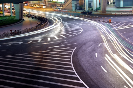 Night in Shanghai traffic light trailsの写真素材