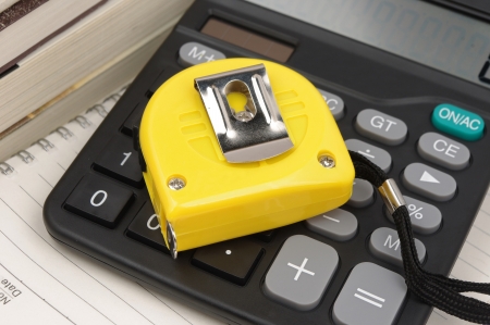 Ruler and calculator  Housing construction or renovation prices concept の写真素材