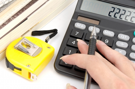 Ruler and calculator  Housing construction or renovation prices concept の写真素材